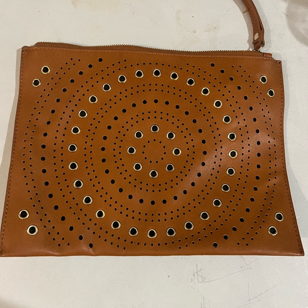 Circle-Pattern Grommet Wristlet Clutch